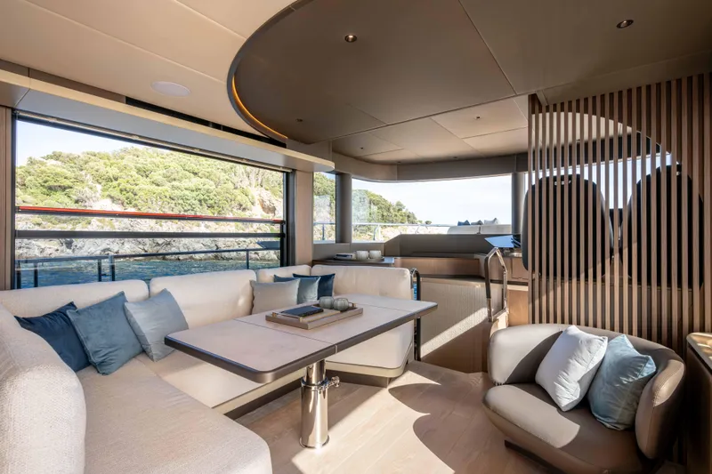 Slide: The Image of Luxurious interior of 2026 Absolute Navetta 58 yacht with scenic ocean view. - 35
