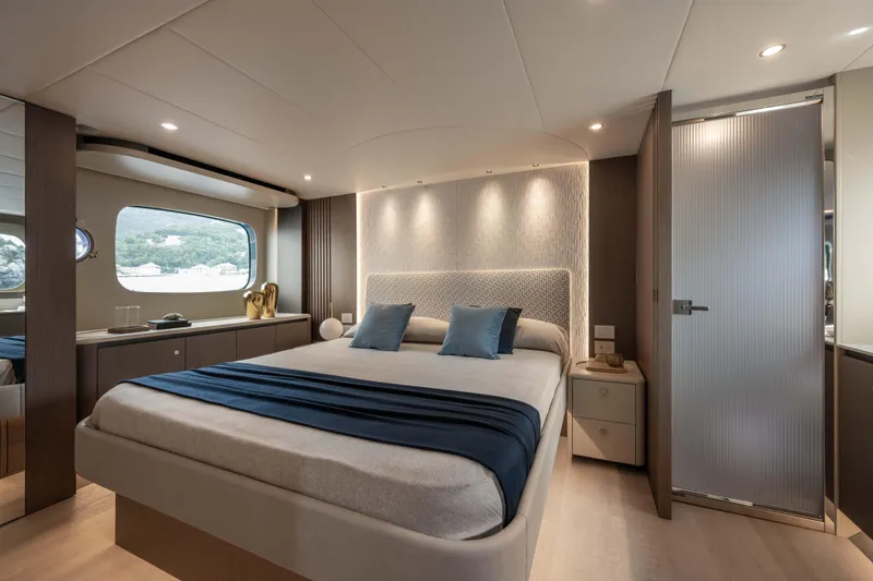 Slide: The Image of Luxurious bedroom interior of 2026 Absolute Navetta 58 yacht, featuring elegant design and modern amenities. - 44