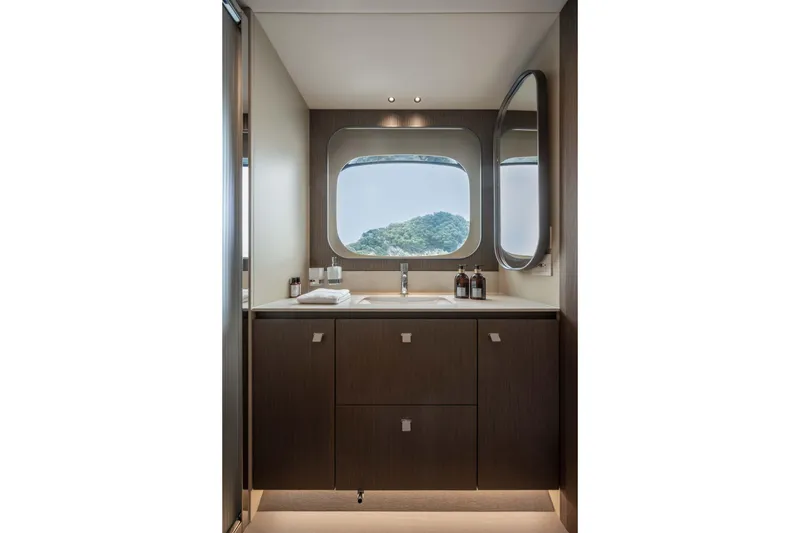 Slide: The Image of Luxurious bathroom interior of 2026 Absolute Navetta 58 yacht with scenic window view. - 47