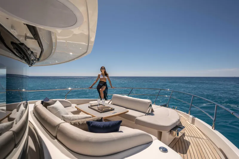 Slide: The Image of Luxury yacht Absolute Navetta 58, 2026 model, with elegant deck seating and ocean view. - 18