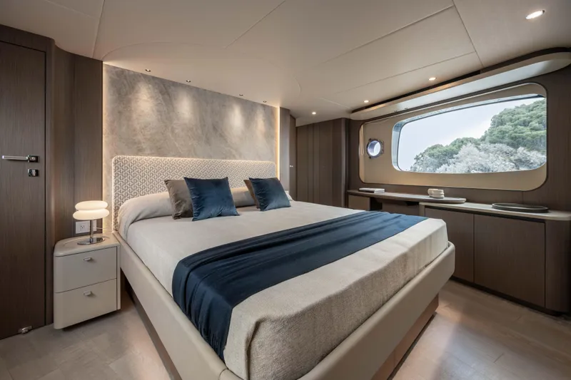 Slide: The Image of Luxurious bedroom interior of 2026 Absolute Navetta 58 yacht with scenic window view. - 38