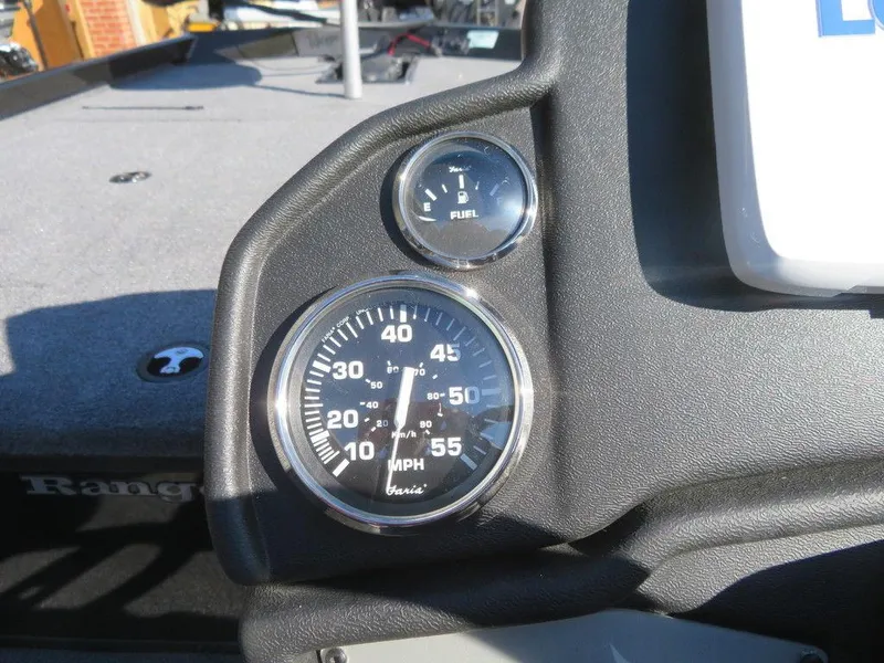 Slide: The Image of Dashboard of 2023 Ranger RT188 boat with speedometer and fuel gauge. - 11