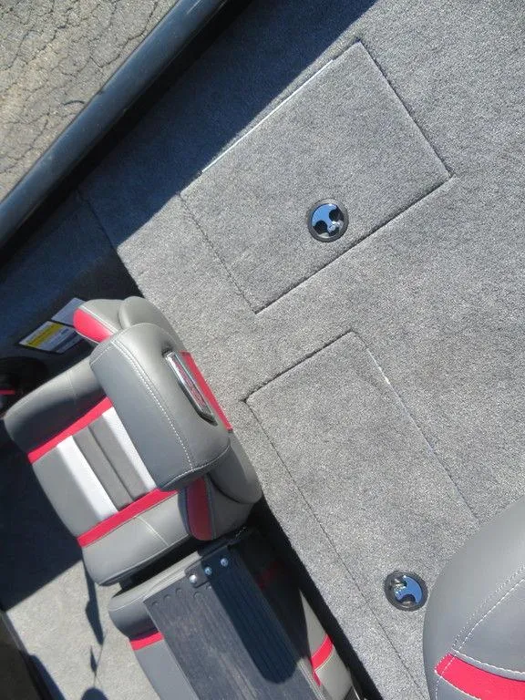 Slide: The Image of 2023 Ranger RT188 boat interior with gray and red seating, storage compartments. - 15
