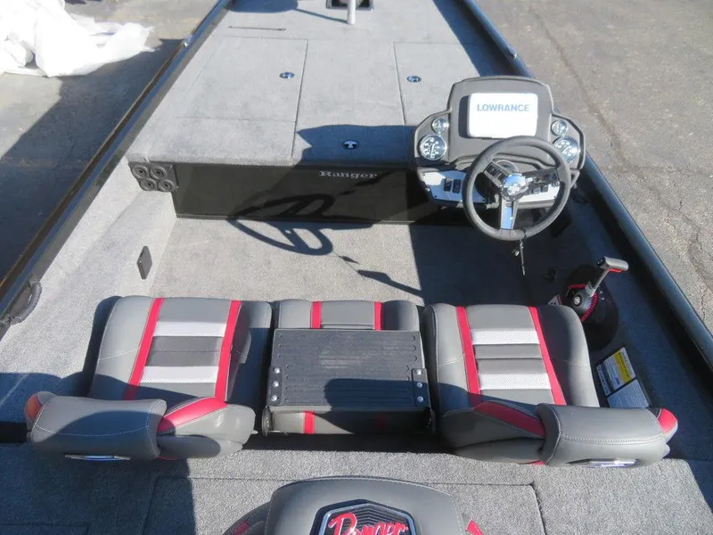 Slide: The Image of 2023 Ranger RT188 boat interior with steering wheel and seating. - 16
