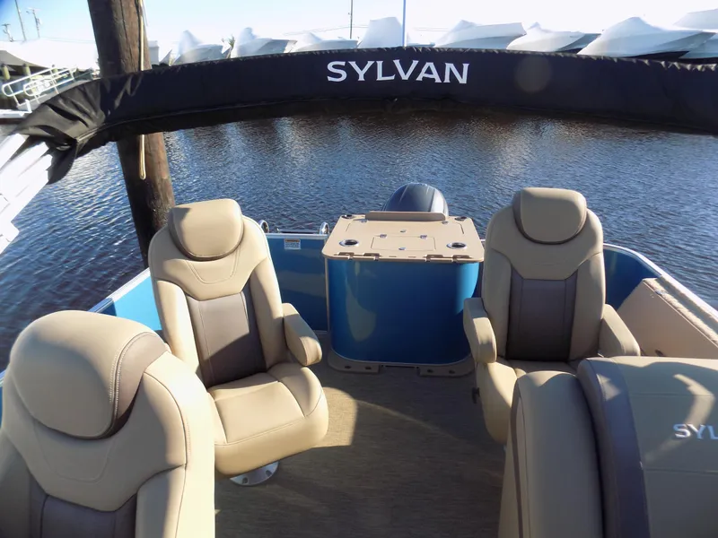 Slide: The Image of 2021 Sylvan L3 Party Fish boat interior with comfortable seating and water view. - 3