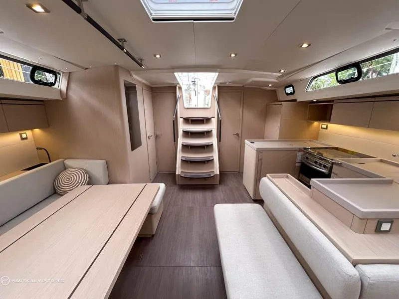 Slide: The Image of Luxurious interior of 2024 Beneteau Oceanis 51.1 yacht with modern furnishings and spacious layout. - 17