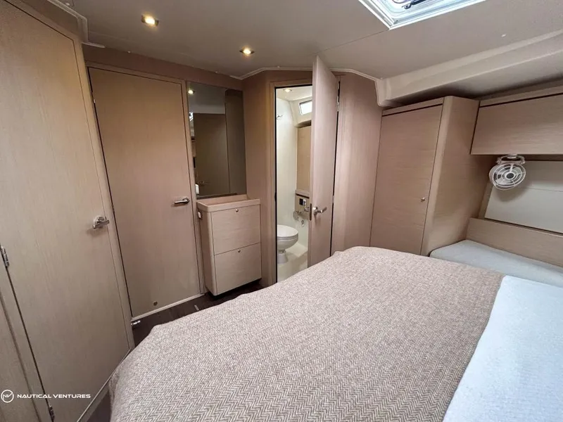Slide: The Image of Luxurious cabin interior of 2024 Beneteau Oceanis 51.1 yacht with modern furnishings. - 29