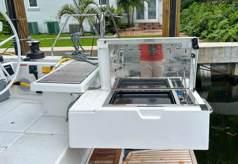 Slide: The Image of 2024 Beneteau Oceanis 51.1 yacht with outdoor grill station. - 8