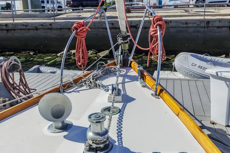 Slide: The Image of Deck view of a 1961 Lapworth 40 sailboat with ropes and winches. - 19