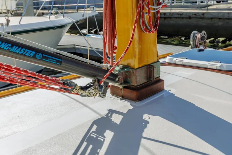 Slide: The Image of Close-up of a 1961 Lapworth 40 sailboat mast and rigging on deck. - 28