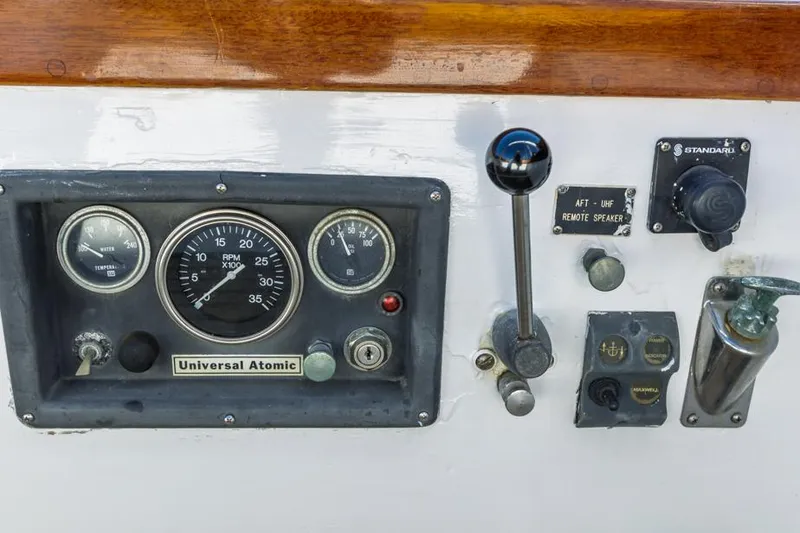 Slide: The Image of Control panel of a 1961 Lapworth 40 boat with Universal Atomic engine gauges. - 37