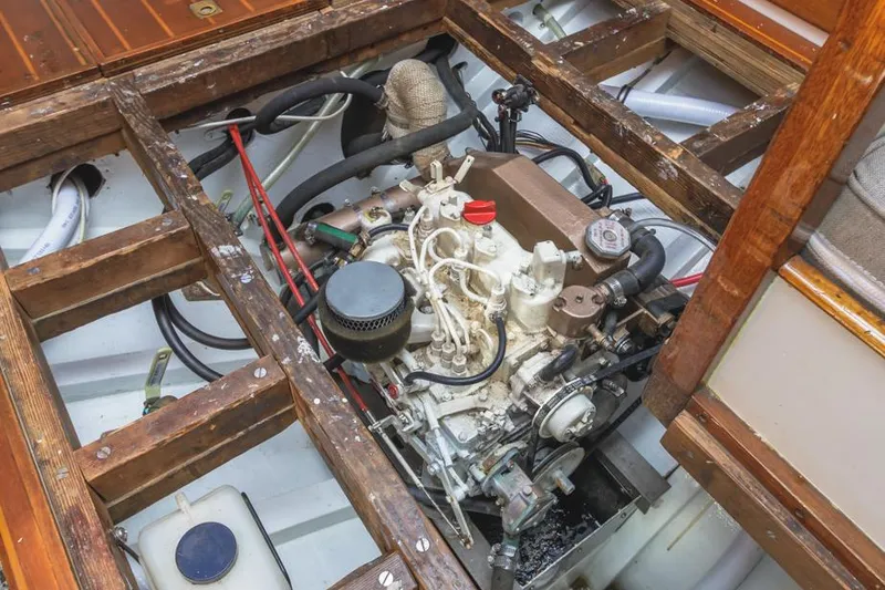 Slide: The Image of Engine compartment of a 1961 Lapworth 40 boat, showcasing detailed mechanical components. - 7