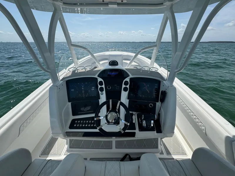 Slide: The Image of 2003 Deep Impact 36 Open boat dashboard with ocean view. - 12