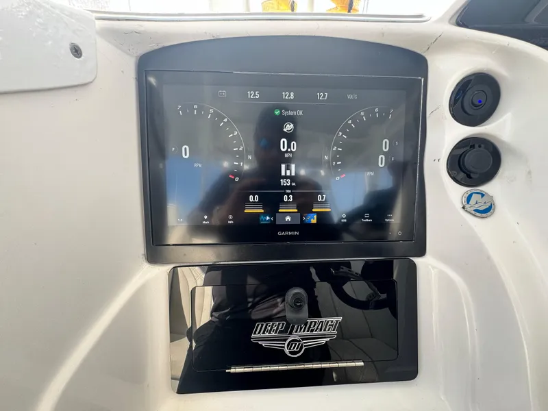 Slide: The Image of Dashboard of a 2003 Deep Impact 36 Open boat with digital display. - 15