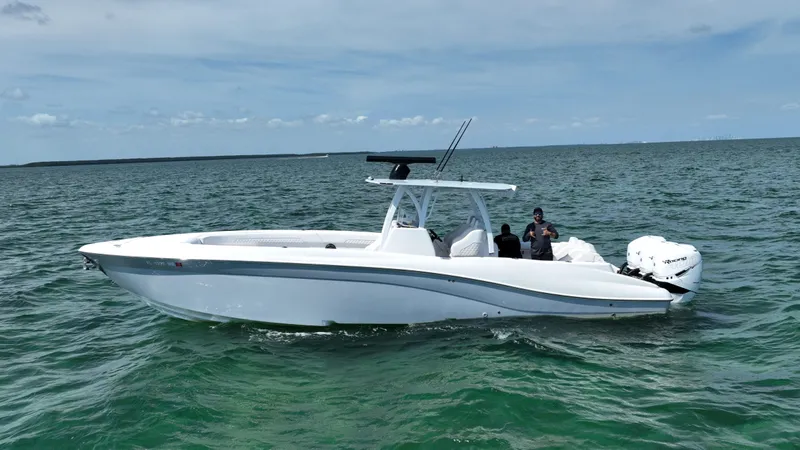 Slide: The Image of 2003 Deep Impact 36 Open boat cruising on the ocean. - 2