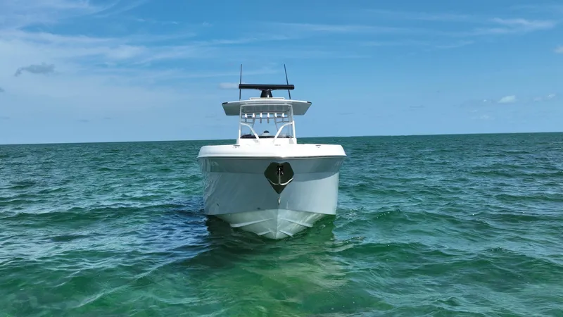 Slide: The Image of 2003 Deep Impact 36 Open boat on clear ocean water. - 7