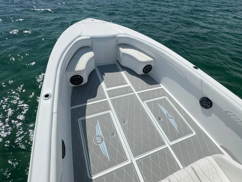 Slide: The Image of 2003 Deep Impact 36 Open boat with spacious seating and stylish deck design. - 9