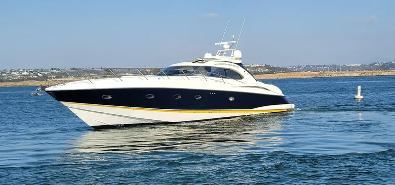 Slide: The Image of 2000 Sunseeker Predator 58 yacht on calm waters. - 10