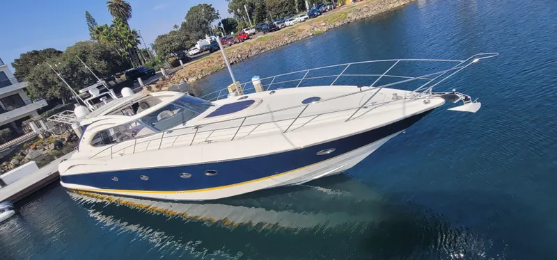Slide: The Image of 2000 Sunseeker Predator 58 yacht on water, side view. - 13