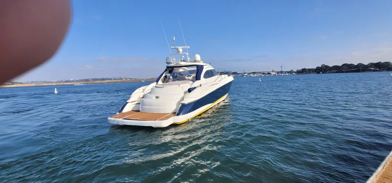 Slide: The Image of 2000 Sunseeker Predator 58 yacht on open water. - 7