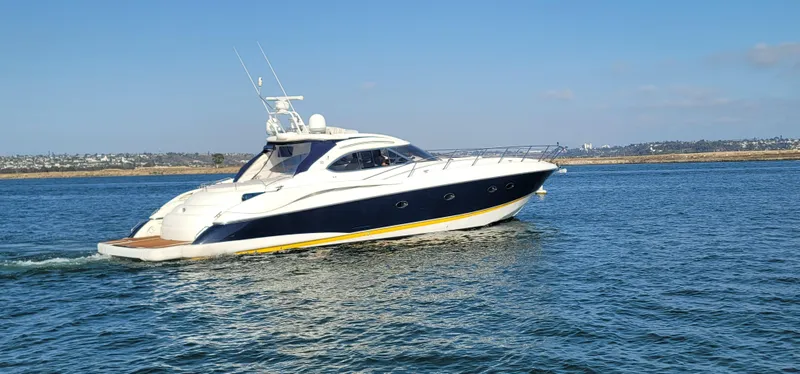 Slide: The Image of Sunseeker Predator 58 Yacht from 2000 on open water. - 2