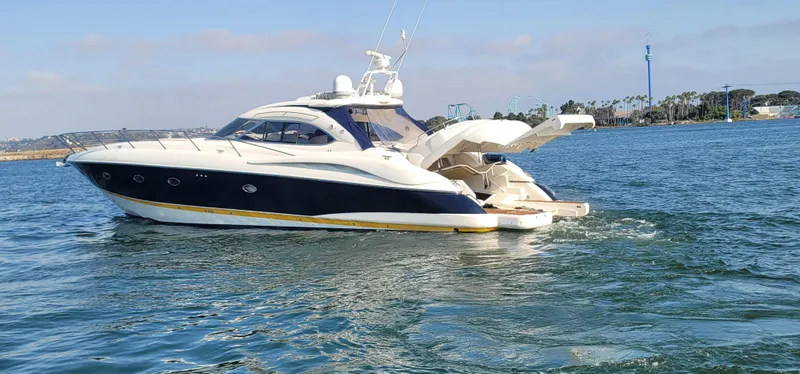 Slide: The Image of 2000 Sunseeker Predator 58 yacht cruising on water. - 9