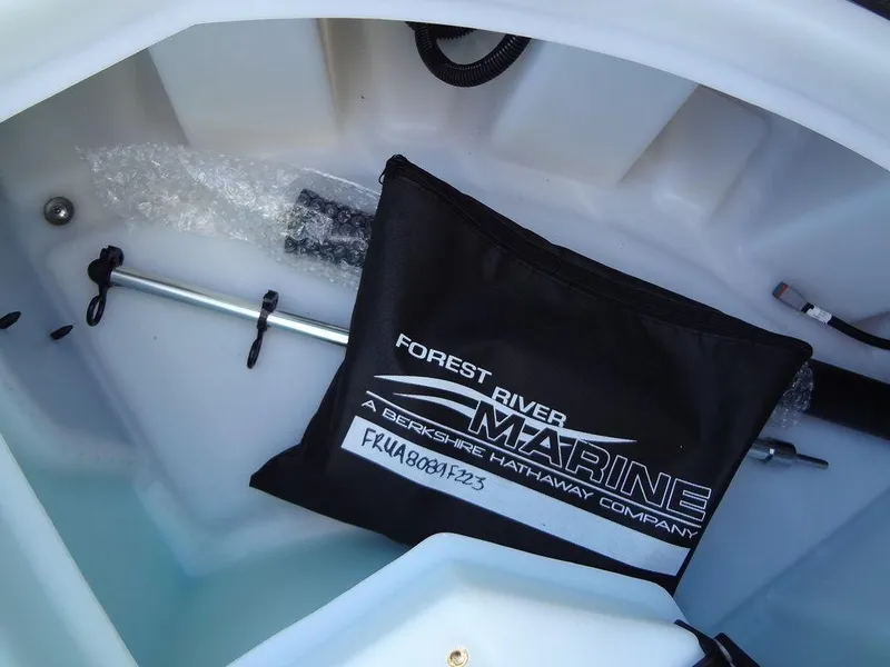 Slide: The Image of 2023 Berkshire 25RFX STS 3.0+ boat compartment with Forest River Marine bag. - 14
