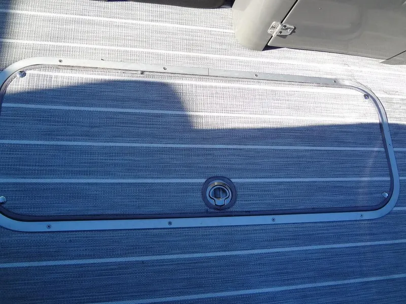 Slide: The Image of 2023 Berkshire 25RFX STS 3.0+ boat deck with metal frame and latch. - 20