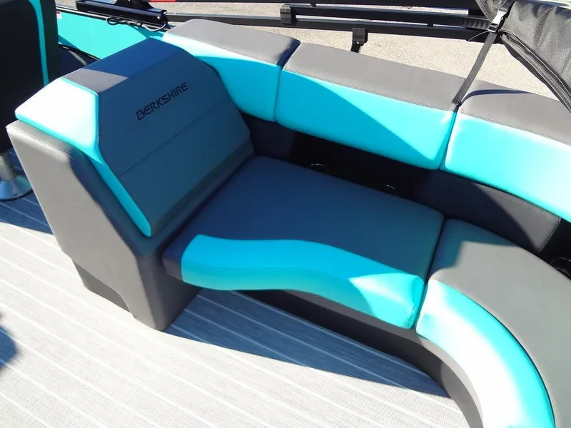 Slide: The Image of 2023 Berkshire 25RFX STS 3.0+ boat seating, turquoise and gray upholstery. - 23