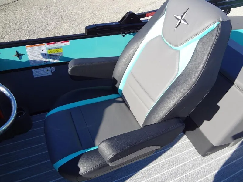 Slide: The Image of 2023 Berkshire 25RFX STS 3.0+ boat seat with teal and gray design. - 27