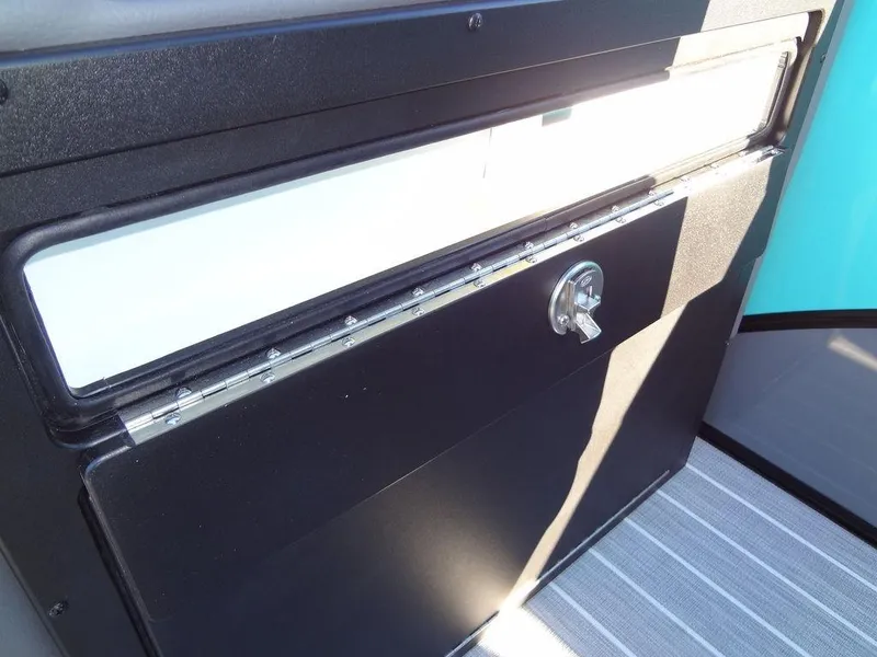 Slide: The Image of 2023 Berkshire 25RFX STS 3.0+ storage compartment with lock, interior view. - 41