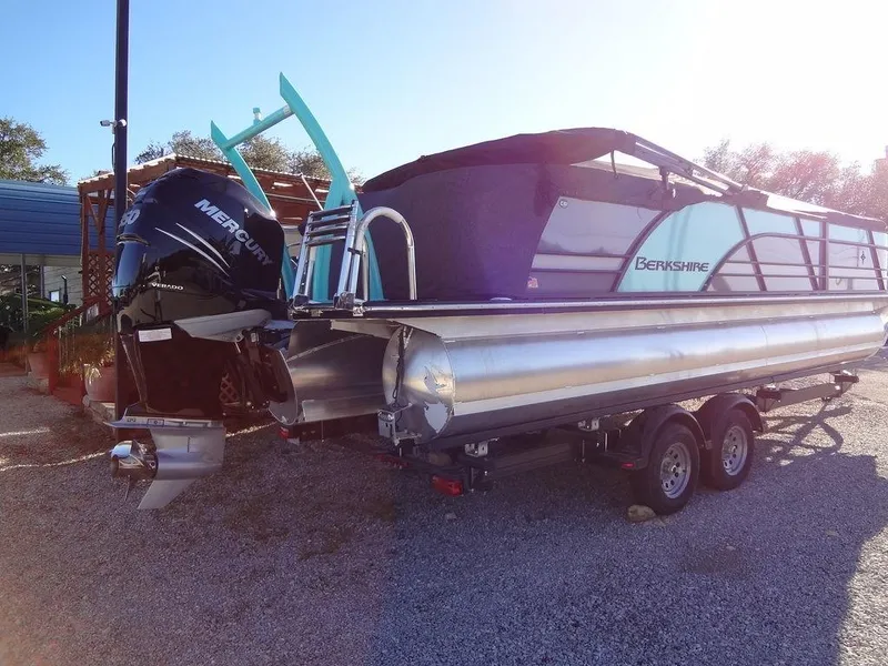 Slide: The Image of 2023 Berkshire 25RFX STS 3.0+ pontoon boat with Mercury outboard engine on trailer. - 6