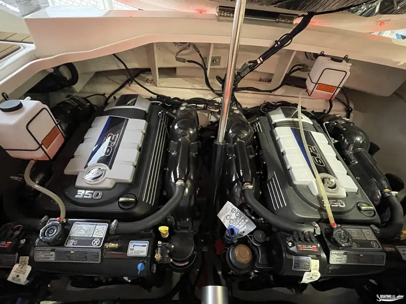 Slide: The Image of Twin engines in a 2023 Sea Ray 310 SLX boat, showcasing powerful performance. - 27