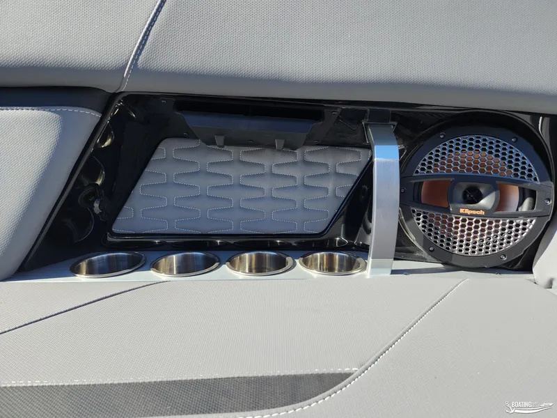 Slide: The Image of 2023 MasterCraft X26 interior with Klipsch speaker and cup holders. - 14