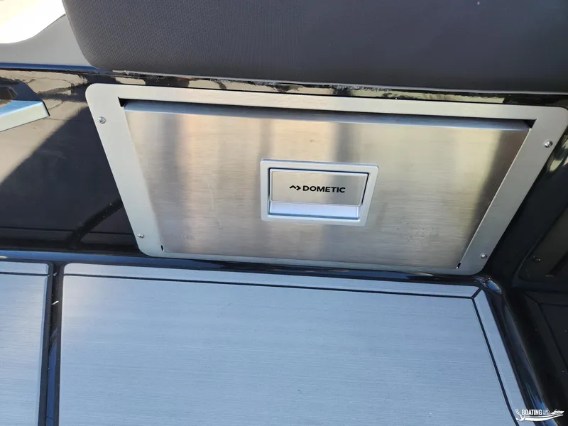 Slide: The Image of 2023 MasterCraft X26 boat with Dometic stainless steel panel. - 16