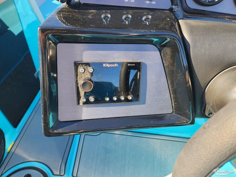 Slide: The Image of 2023 MasterCraft NXT20 dashboard featuring Klipsch audio control panel. - 15