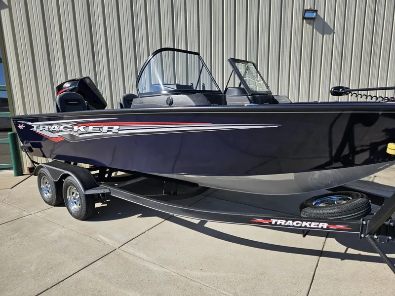 The Image of 2023 Tracker Targa V-19 WT boat on trailer, parked outside. - 0