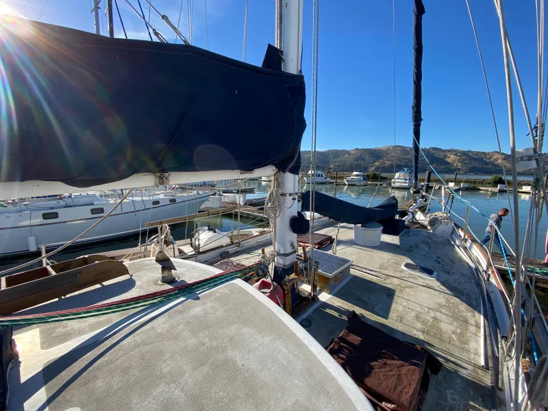 Slide: The Image of Sailboat deck view, CT 48 model, 1979, docked in a sunny marina. - 15