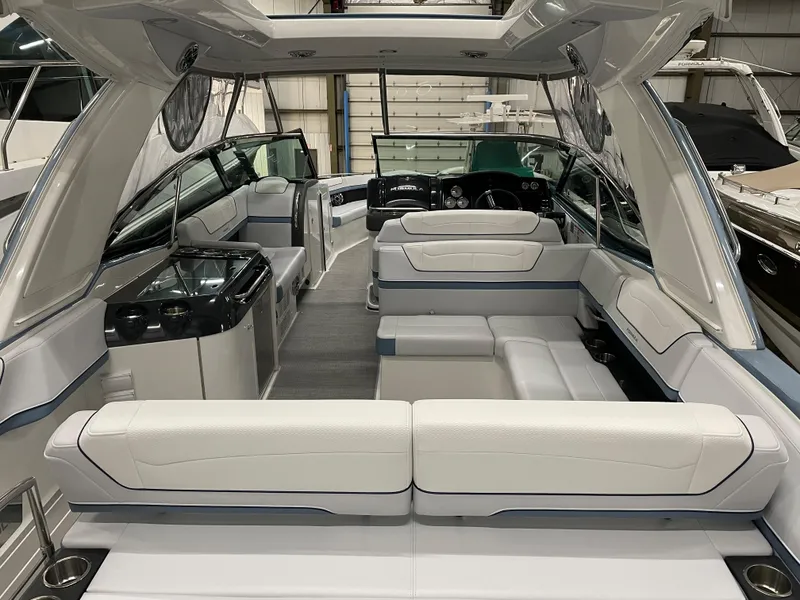 Slide: The Image of 2022 Formula 350 Crossover Bowrider interior with luxurious seating and modern amenities. - 15