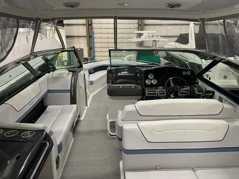 Slide: The Image of 2022 Formula 350 Crossover Bowrider interior with luxurious seating and modern dashboard. - 16