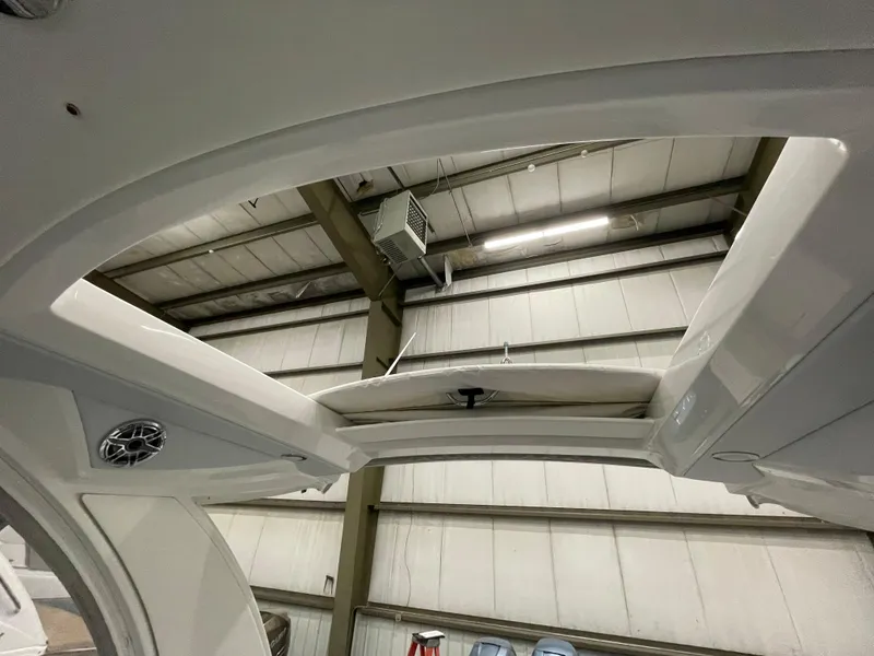 Slide: The Image of Interior view of 2022 Formula 350 Crossover Bowrider in a warehouse. - 17