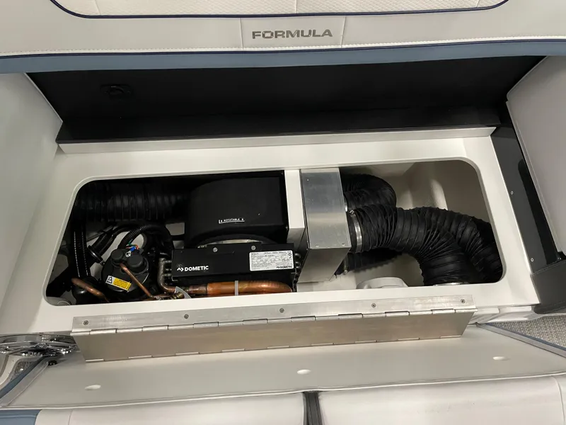 Slide: The Image of Engine compartment of a 2022 Formula 350 Crossover Bowrider boat. - 28