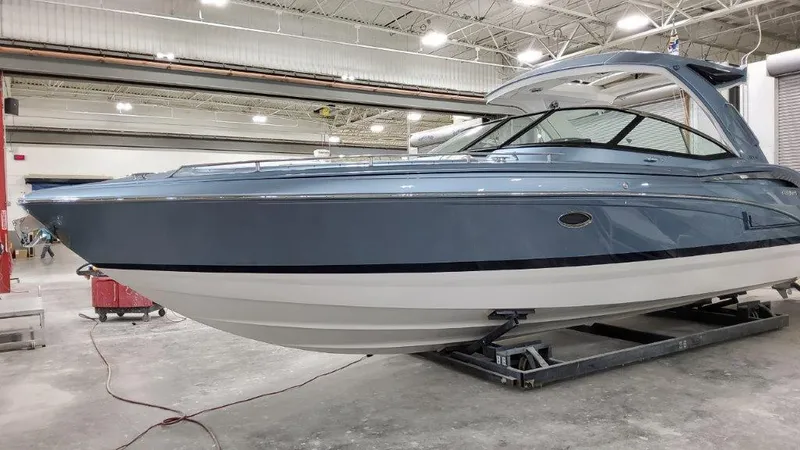 Slide: The Image of 2022 Formula 350 Crossover Bowrider in a showroom. - 3