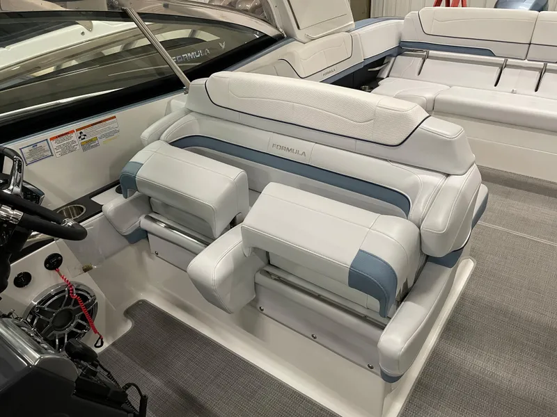 Slide: The Image of 2022 Formula 350 Crossover Bowrider interior seating and helm area. - 35