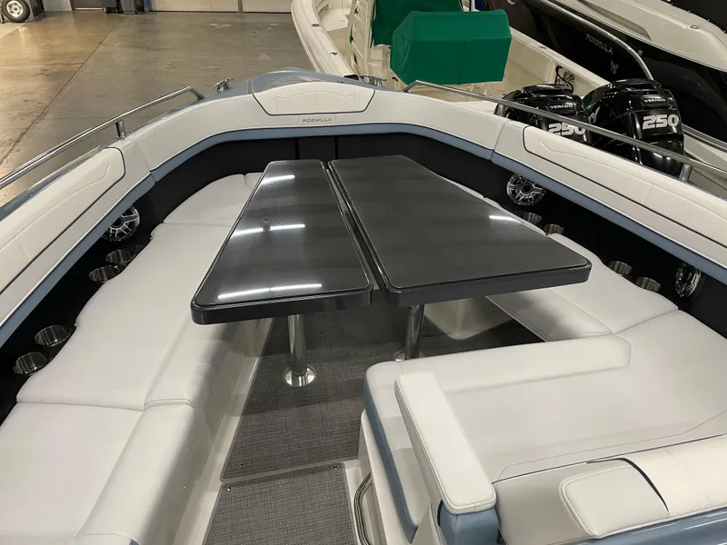 Slide: The Image of 2022 Formula 350 Crossover Bowrider interior with seating and table. - 41