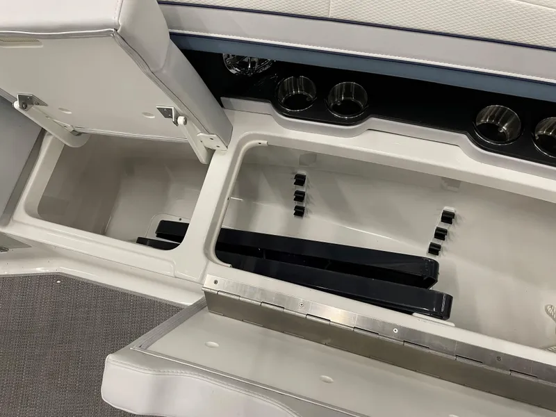 Slide: The Image of Storage compartments in the 2022 Formula 350 Crossover Bowrider boat. - 42