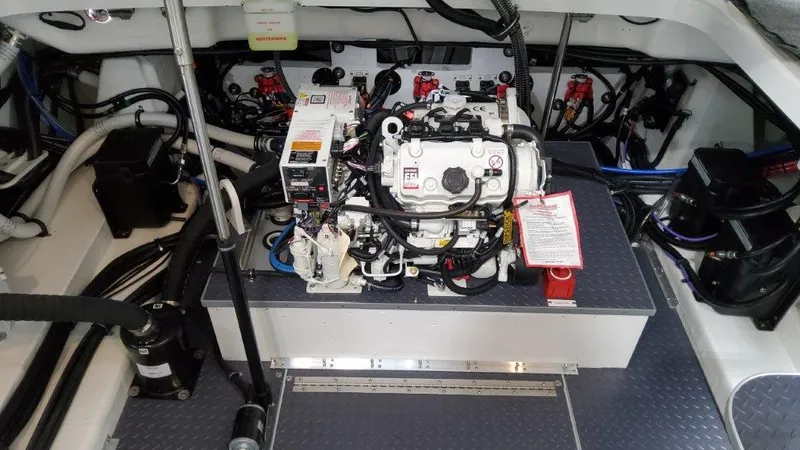 Slide: The Image of Engine compartment of a 2022 Formula 350 Crossover Bowrider boat. - 9