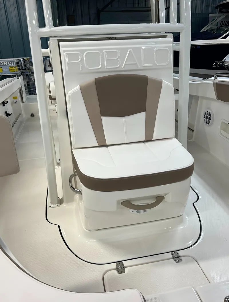 Slide: The Image of 2023 Robalo R222 Center Console boat seat with storage compartment. - 20