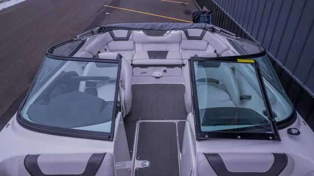 Slide: The Image of The image shows the cockpit of a 2014 Yamaha SX192 boat with gray upholstery. - 5