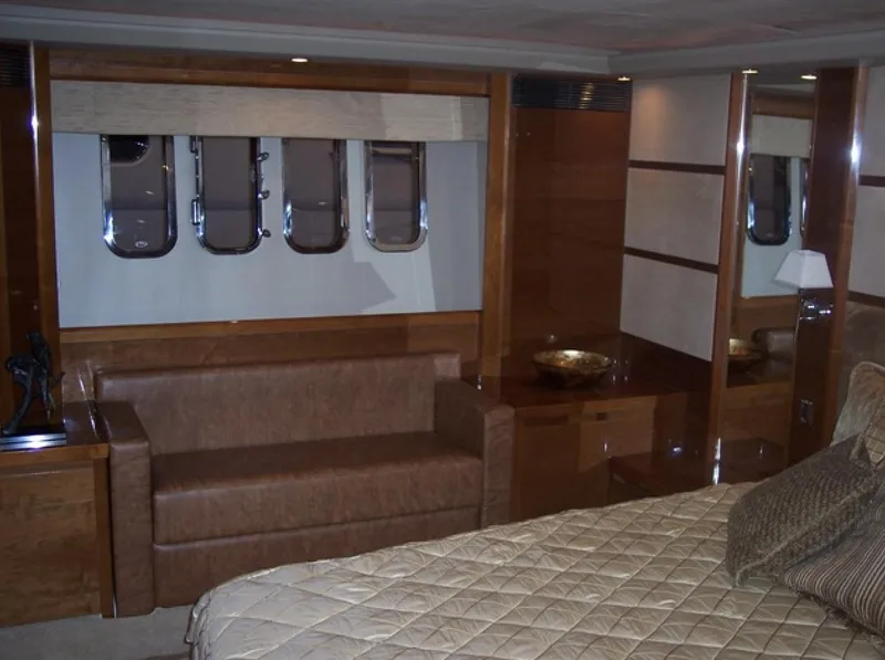 Slide: The Image of Luxurious interior of a 2006 Princess V70 yacht with elegant wood finishes. - 25